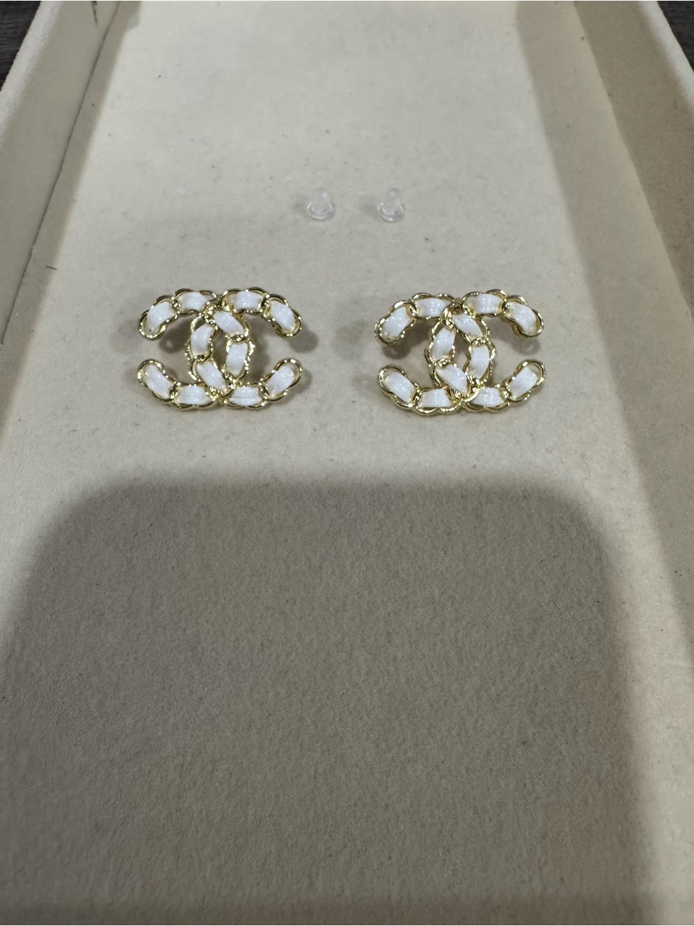 White & gold studs